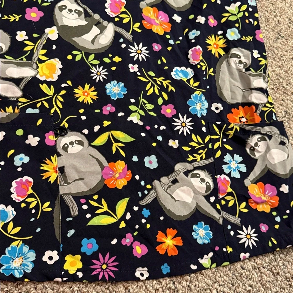 Vibrant Floral stretch Scrub Top - Picture 2 of 5